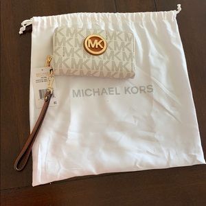 White and tan leather Michael Kors wallet